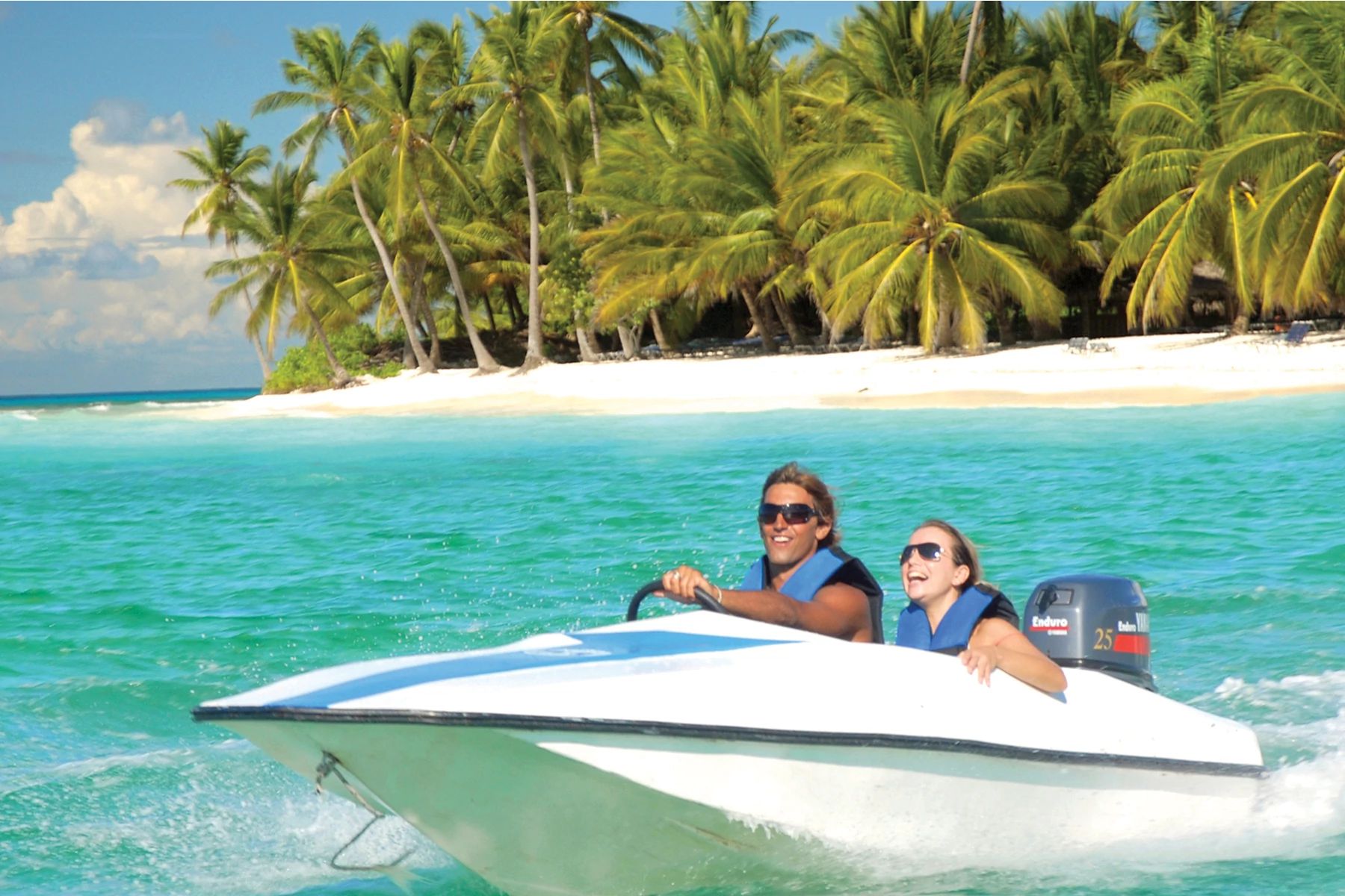Dominican-Republic-Punta-Cana-Couple-Riding-Speedboat-id1699-May-30-2023